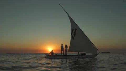 Tourists watching sunset while sailing in sailboat Stock Footage 85775189