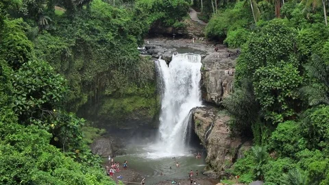 Tourists at a waterfall Stock Footage 72474224