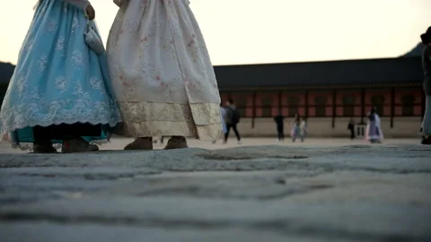 Tourists Wearing Hanbok While Visiting Gyeongbokgung Stock Footage 217957107