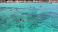 Tourists while swimming in the blue lagoon, Mediterranean, Cyprus HD Footage
