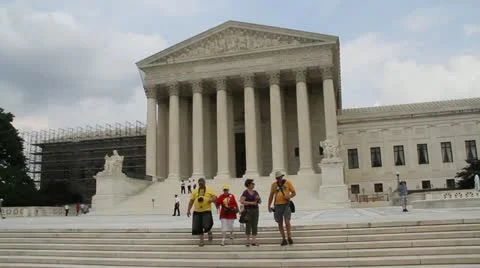 Toursits walk down the steps of the Supreme Court Video stock 17046801