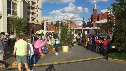 Toursits walking on Manezh square in city center of Moscow, Russia Stock Footage 80896644