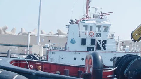 A tow boat sails in the harbor 4 Stock Footage 118591649