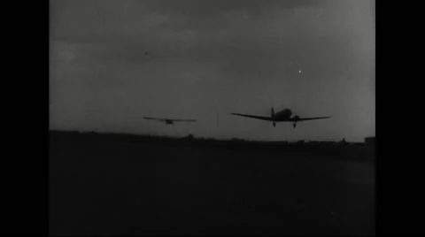 Tow planes lifting gliders into sky Stock Footage