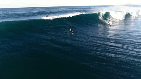 Tow-In Surfer Caught Mid-Barrel as Curling Wave Blasts White Mist Skyward Stock Footage 310643963
