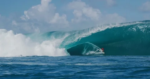 Tow surfing on a huge wave Stock Footage 114805941