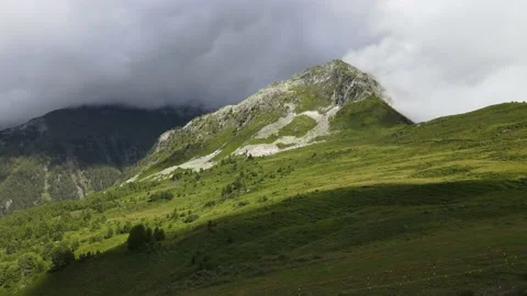 Towards an alpine peak close to the ground Stock Footage 138881321