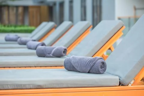 Towel on a canvas bed Stock Photos