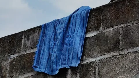 Towel drying rack moving in the wind Stock Footage 284297460