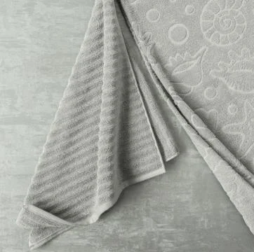 A towel on gray background Stock Photos