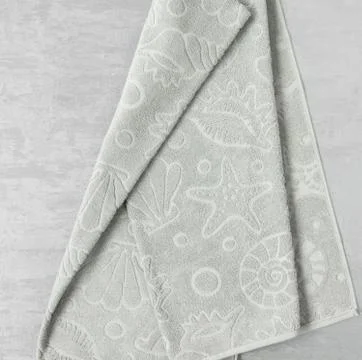 A towel on gray background Stock Photos