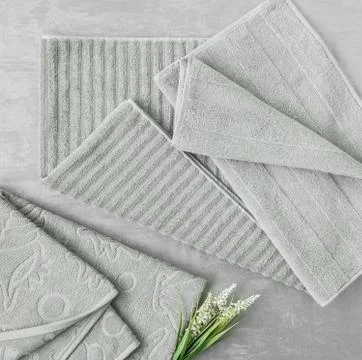 A towel on gray background Stock Photos