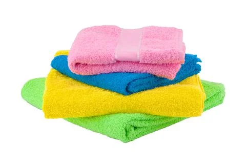 Towel isolated on white background. Stack of colorful towels Stock Photos