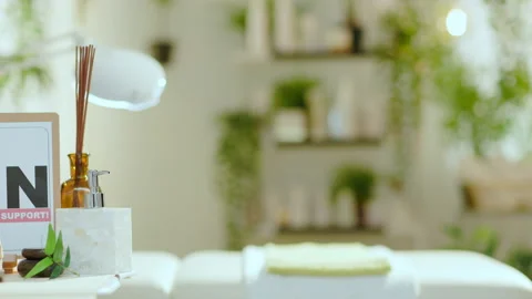 Towel, massage table and after covid open sign Video stock 157683350