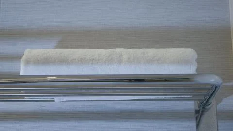 Towel on a shelf Stock Photos