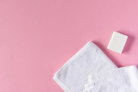Towel with soap on a pink background Stock Photos