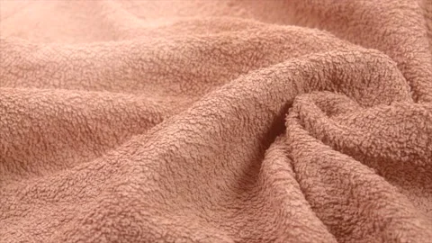 Towel texture closeup. Soft beige color cotton towel backdrop, fabric background Stock Footage 134903591