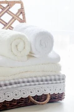 Towels in a basket Stock Photos