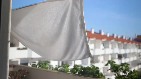 Towels drying on balcony Stock Footage 100635680