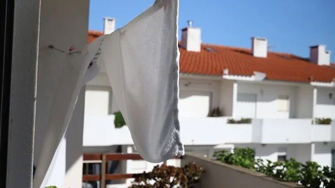 Towels drying on balcony Stock Footage 100635701