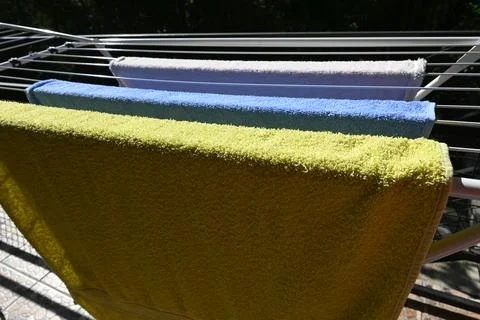 Towels drying on a clothesline Photos