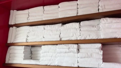 Towels stack towel, close up video of terry towels in a shelf Stock Footage 296219402