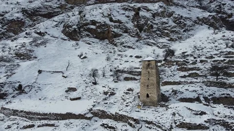 Tower of Abayev ruins in the Upper Balkaria mountains Stock Footage 167580563