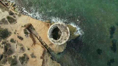 Tower of Abbacurrente, Sardinia, Overhead Rising Drone clip 4K Stock Footage 196269740
