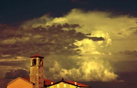 Tower against tempestuous sky Фото