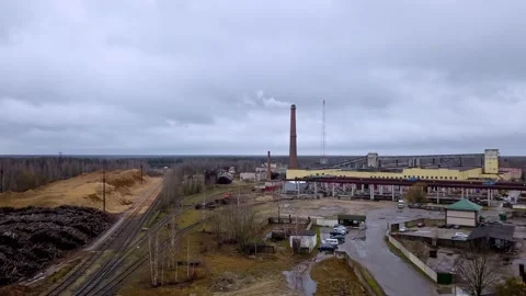 Tower and brick building. Ecological problem concept. Stock Footage 159352332