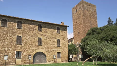 The tower and the building that borders the Torre di Lavello Park Stock Footage 214048239