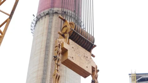 Tower and part of crane at the construction site of the coal-fired power station Stock Footage 137572609
