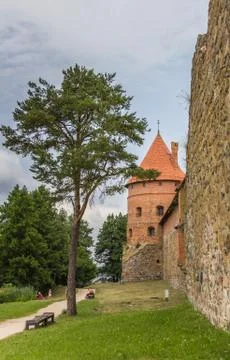 Tower and wall of the trakai red brick castle Stock Photos