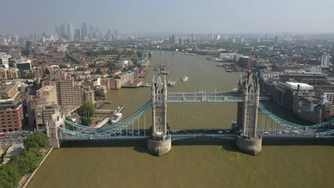 Tower Bridge across Thames river, skyscrapers in distance Video stock 161194217