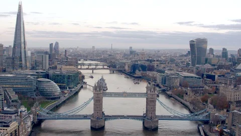 Tower Bridge aerial view looking over London Stock Footage 125760661