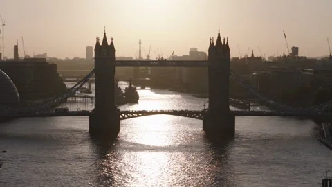 Tower Bridge aerial view at sunset, London skyline and River Thames Stock Footage 329183572