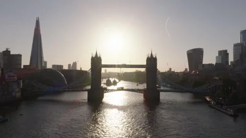 Tower Bridge aerial view at sunset, London skyline and River Thames Stock Footage 329183653