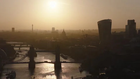 Tower Bridge aerial view at sunset, London skyline and River Thames Stock Footage 329184171