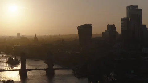 Tower Bridge aerial view at sunset, London skyline and River Thames Stock Footage 329184569