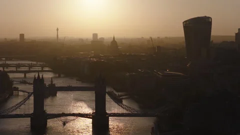 Tower Bridge aerial view at sunset, London skyline and River Thames Stock Footage 329184798