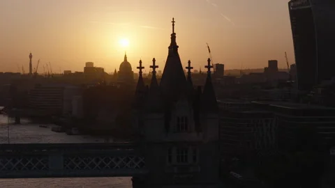 Tower Bridge aerial view at sunset, London skyline and River Thames Stock Footage 329185182
