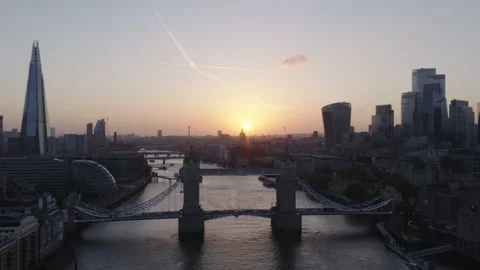 Tower Bridge aerial view at sunset, London skyline and River Thames Stock Footage 329185401