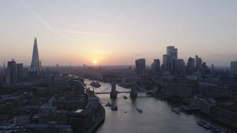 Tower Bridge aerial view at sunset, London skyline and River Thames Stock Footage 329186123