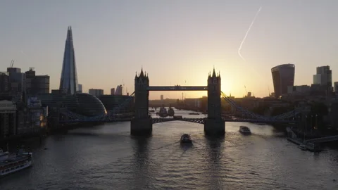 Tower Bridge aerial view at sunset, London skyline and River Thames Stock Footage 329189600
