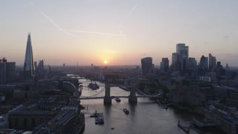 Tower Bridge aerial view at sunset, London skyline and River Thames Stock Footage 329189648