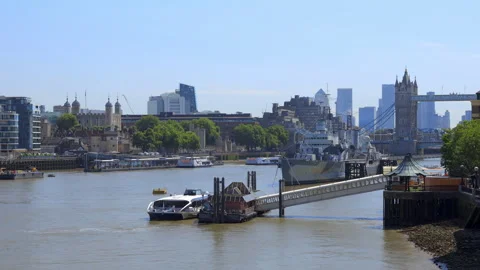 Tower Bridge and the River Thames seen from London Bridge and the HMS Belfast Video stock 321460502