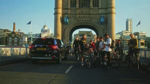 Tower Bridge bicycle event part of Critical Mass London Stock Footage 196008632
