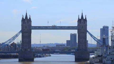Tower Bridge captured in bright summer light with clear blue skies in London Stock Footage 321685809
