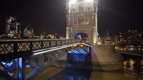 Tower bridge close up lifting opening boat cruise tourists passing under it Stock Footage 101427791