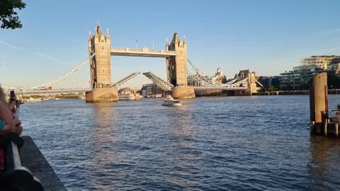 Tower Bridge Closing Over the River Thames in London, UK Stock Footage 310914388